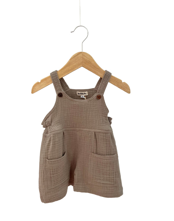 brown cotton jumpsuit with coconut shell button